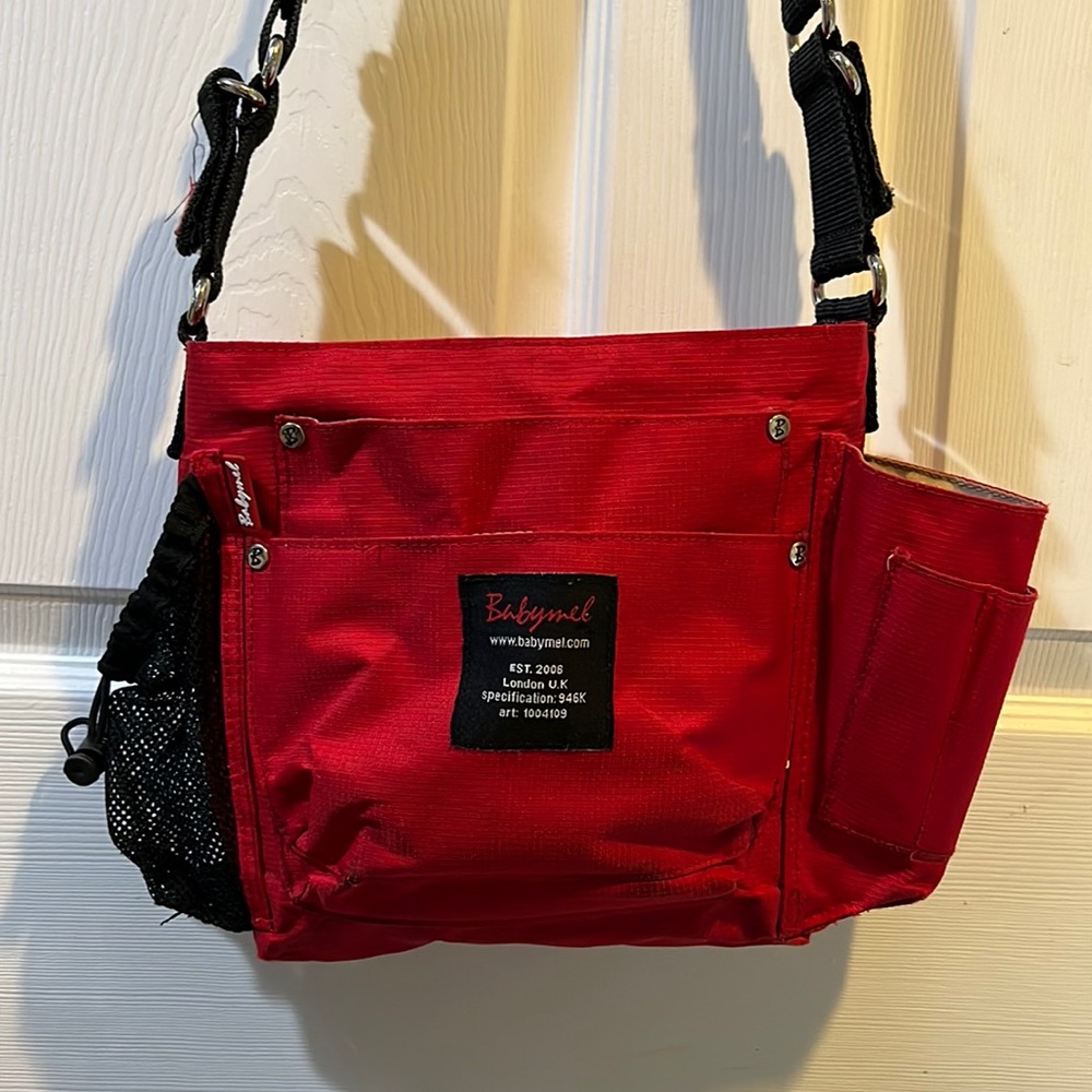 Red Babymel diaper bag